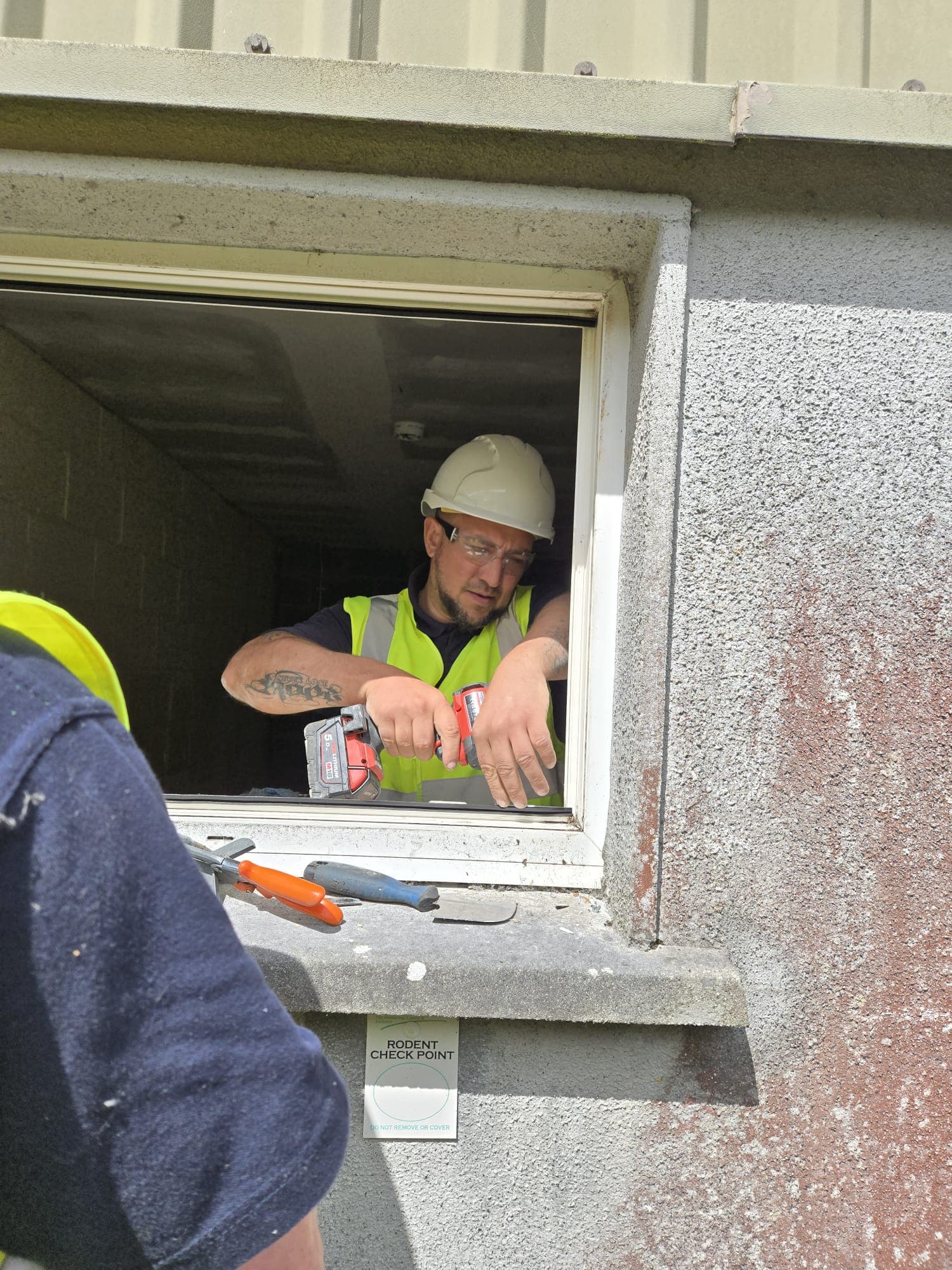 Tradesman captured on site during a window and door upgrade job in Galway.